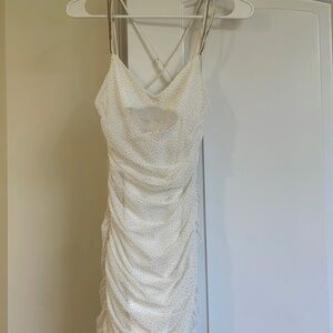 White Lucy in the Sky mini dress, gold sparkle and rhinestone straps.